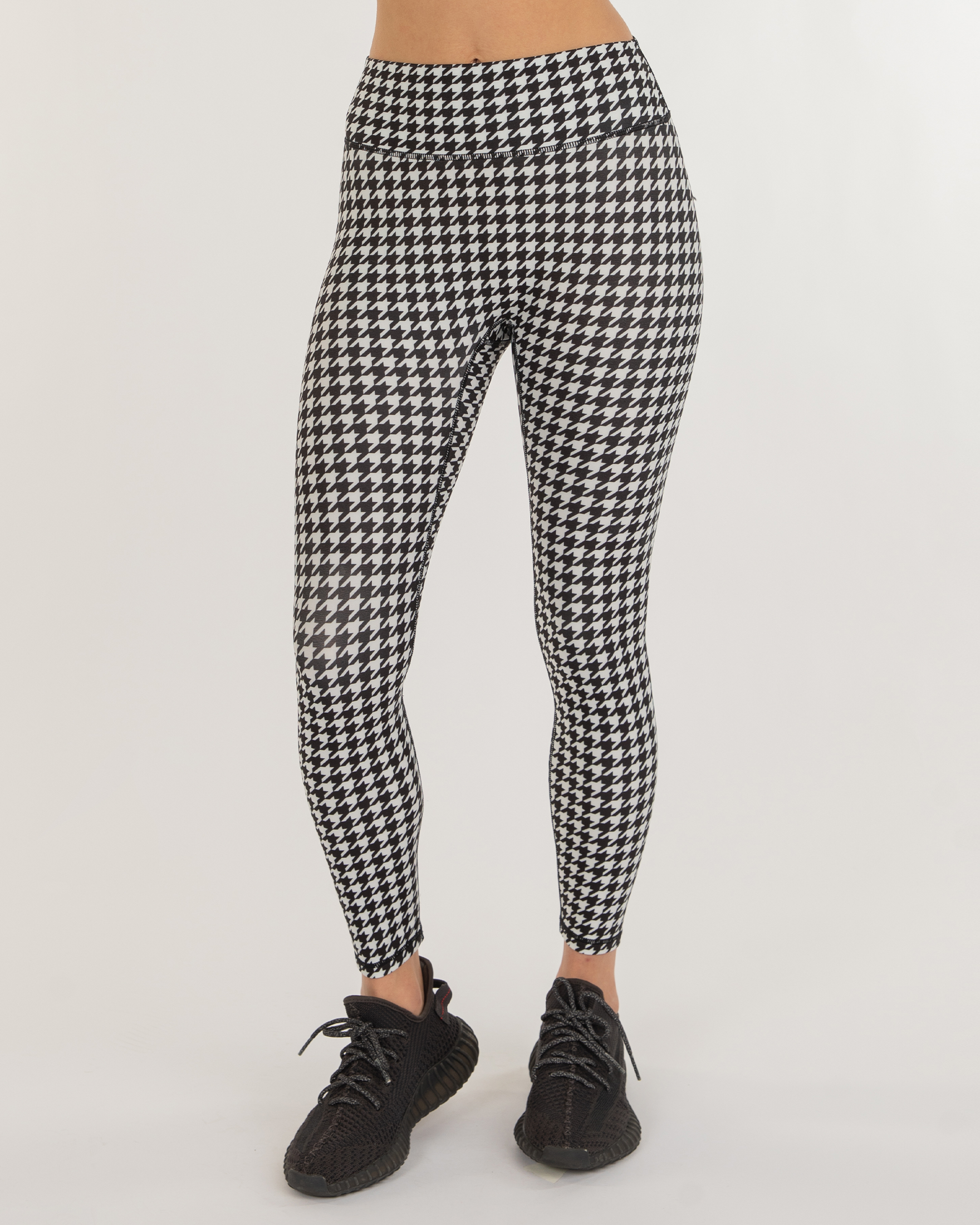 Crimson and houndstooth leggings. Made of a 95% polyester and 5% Spandex  blend. One size fits most., 970052